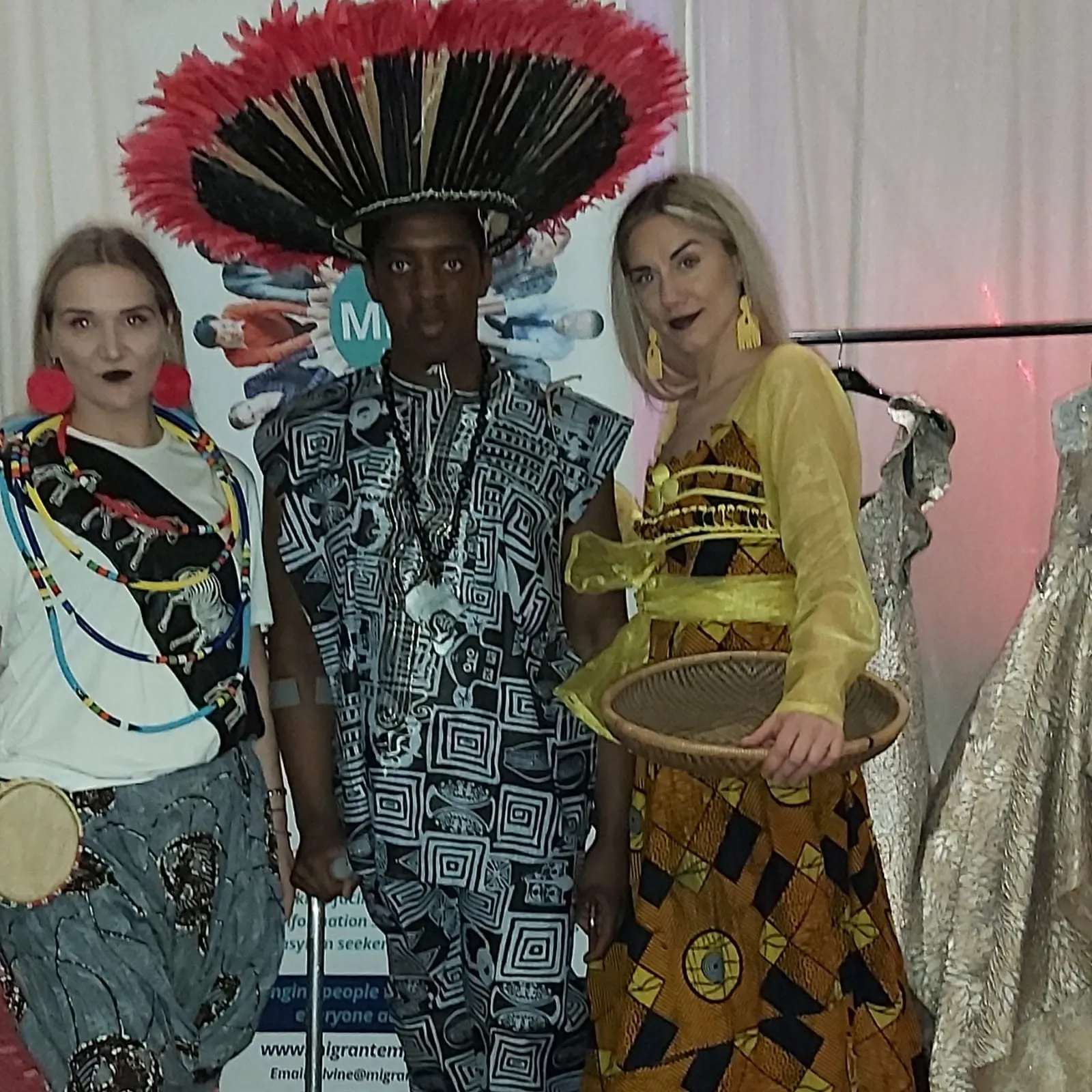 Community members in traditional dress at a MEG culture and heritage event