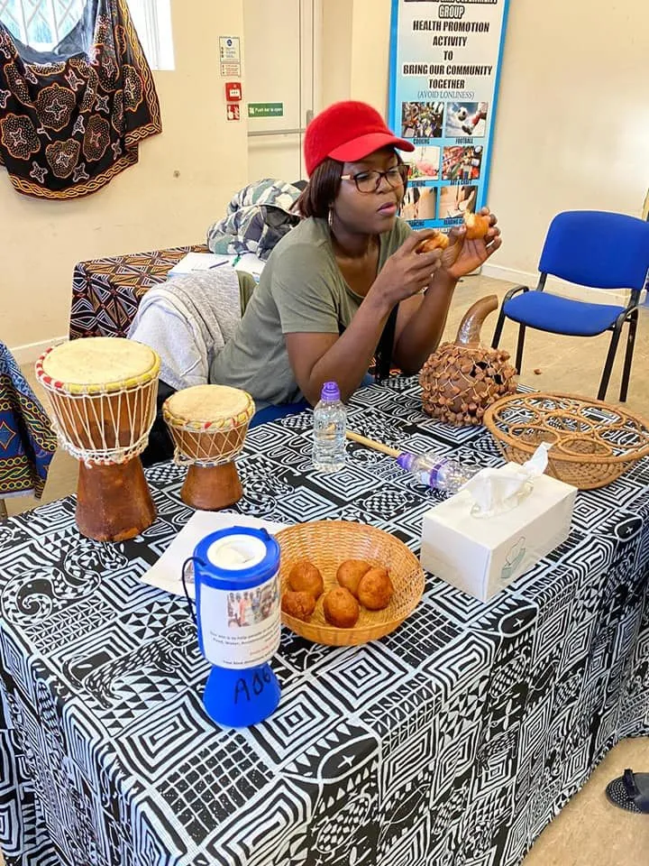A MEG culture stall with drums and traditional crafts