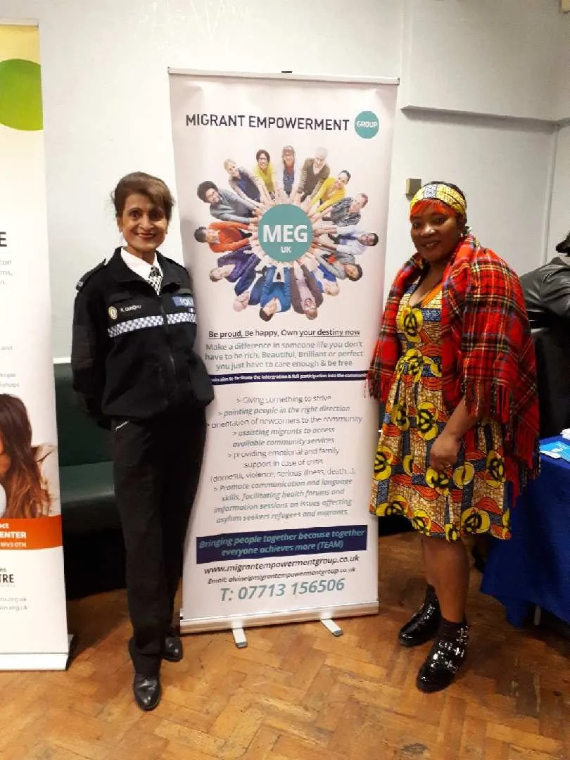 MEG with a partner at a community event
